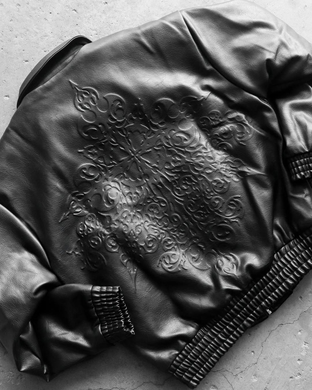 Noir Crest Leather Bomber